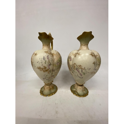 18 - A PAIR OFANTIQUE OLD HALL ENGLAND HANDPAINTED EMBOSSED CERAMIC EWERS WITH FLORAL DECORATION - 40 CM ... 