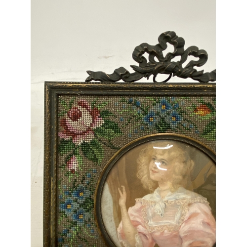 20 - A FRENCH STYLE BEADED MATT FRAME WITH CONVEX GLASS WITH A SILK BACK (POSSIBLY MID VICTORIAN) DEPICTI... 