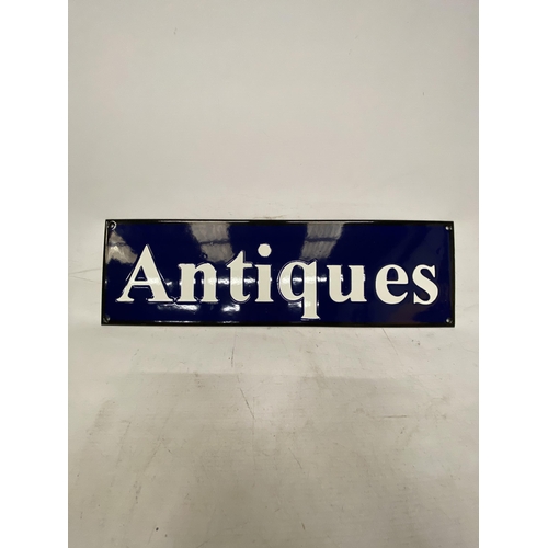 34 - AN ENAMEL ANTIQUES SIGN 51CM X 15CM