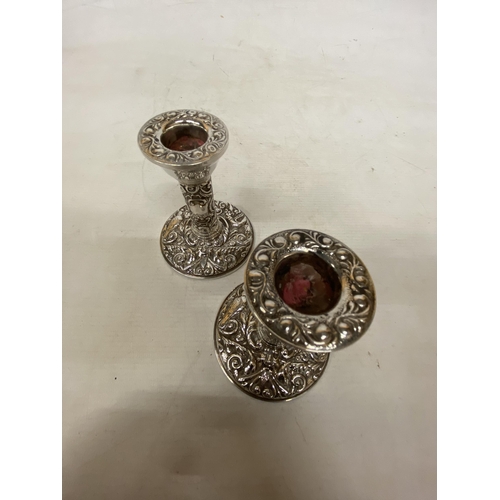 26 - A PAIR OF HALLMARKED BIRMINGHAM SILVER B & CO CANDLESTICKS 1980 WITH WEIGHTED BASES