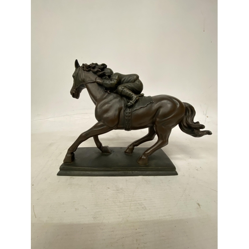 36 - A BRONZED MODEL OF A HORSE AND JOCKEY SIGNED CROSA 1997