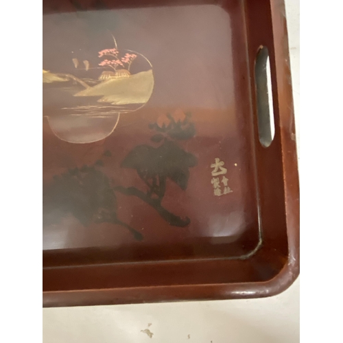 37 - A RECTANGULAR ORIENTAL LAQUERED TRAY