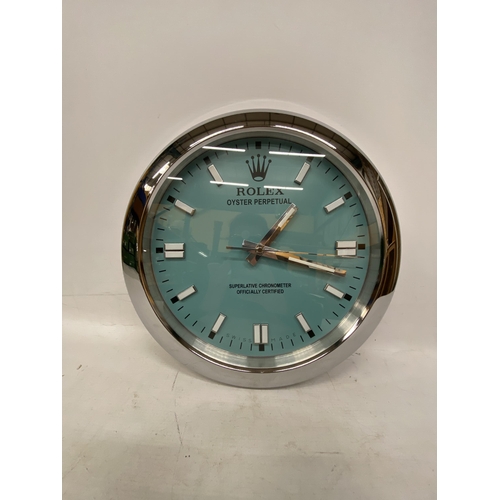 39 - A DEALERS WALL CLOCK