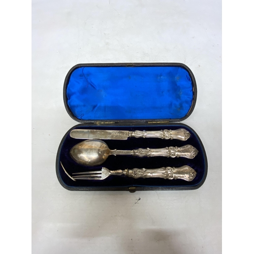 53 - A HALLMARKED BIRMINGHAM SILVER KNIFE, FORK (A/F) AND SPOON SET IN A PRESENTATION BOX GROSS WEIGHT 77... 