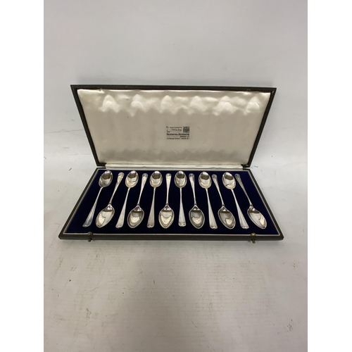 54 - A SET OF TWELVE HALLMARKED LONDON 1937 RATTAIL SPOONS BY GOLDSMITHS AND SILVERSMITHS COMPANY LTD IN ... 