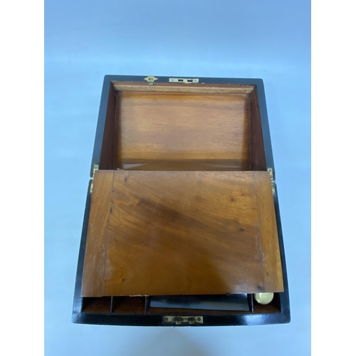 56 - A VINTAGE WALNUT WRITING SLOPE WITH MOTHER OF PEARL INLAY, KEY AND INK BOTTLE