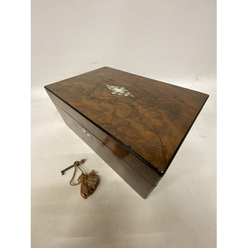 56 - A VINTAGE WALNUT WRITING SLOPE WITH MOTHER OF PEARL INLAY, KEY AND INK BOTTLE