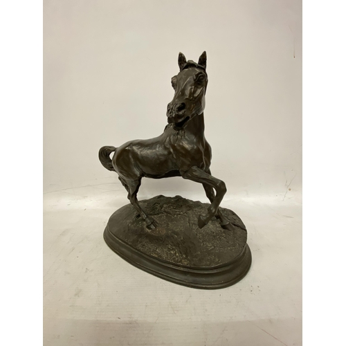 59 - A BRONZE MODEL OF A HORSE ON A PLINTH 31CM TALL