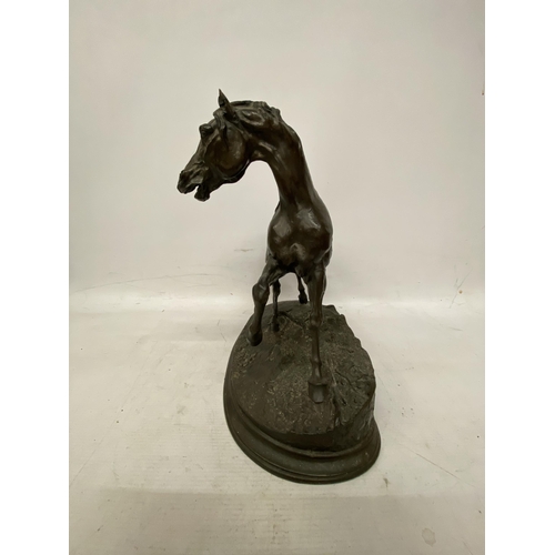 59 - A BRONZE MODEL OF A HORSE ON A PLINTH 31CM TALL