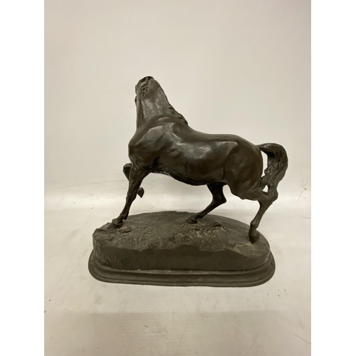 59 - A BRONZE MODEL OF A HORSE ON A PLINTH 31CM TALL