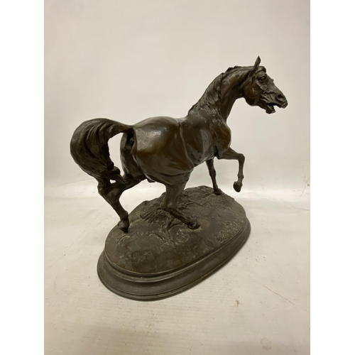 59 - A BRONZE MODEL OF A HORSE ON A PLINTH 31CM TALL