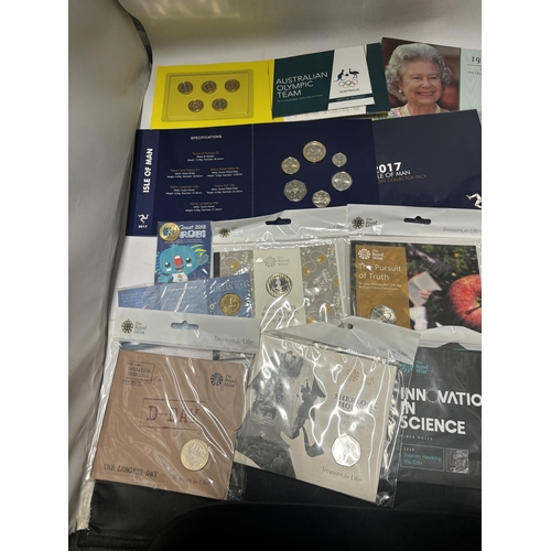 336 - A SELECTION OF SIXTEEN VARIOUS COIN PACKS , UK , IOM AND AUSTRALIA