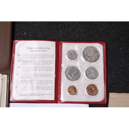 351 - A LARGE SELECTION OF WORLD COINS INCLUDING SILVER . ALSO NOTED A TIBETAN SILVER PAPERWEIGHT . E 60/8... 