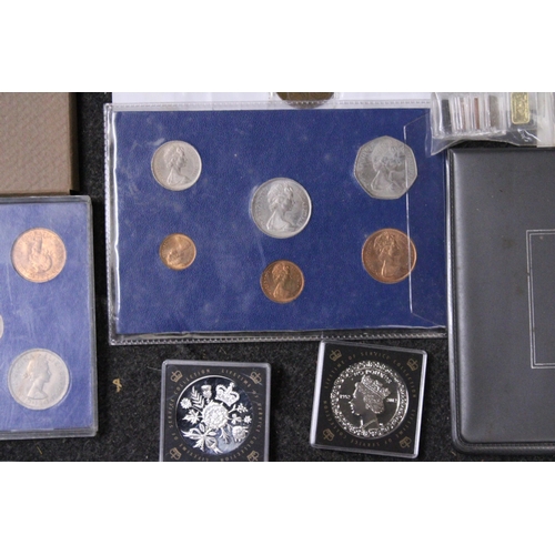 351 - A LARGE SELECTION OF WORLD COINS INCLUDING SILVER . ALSO NOTED A TIBETAN SILVER PAPERWEIGHT . E 60/8... 