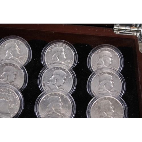 353 - THE CASED COLLECTION OF THIRTY FOUR USA BENJAMIN FRANKLIN HALF DOLLARS