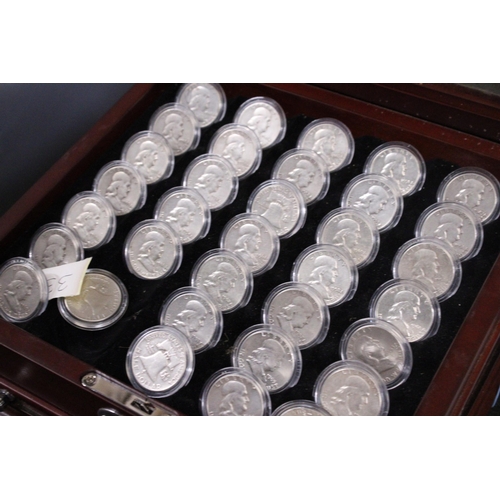 353 - THE CASED COLLECTION OF THIRTY FOUR USA BENJAMIN FRANKLIN HALF DOLLARS