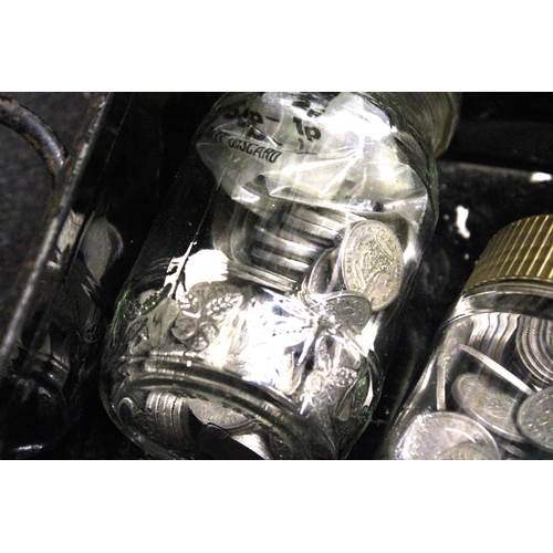 358 - A BLACK DEED BOX HOUSING A HUGE QUANTITY OF UK COINAGE IN JARS, BAGS ETC .