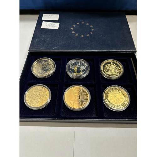 377 - A BOX OF SIX VARIOUS COMMEMORATIVE COINS