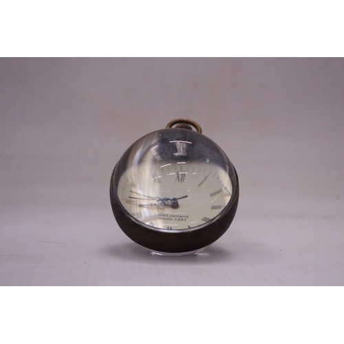 169 - A BRASS AND GLASS BUBBLE CLOCK