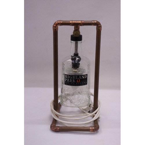 176 - A STEAM PUNK WHISKY BOTTLE LAMP