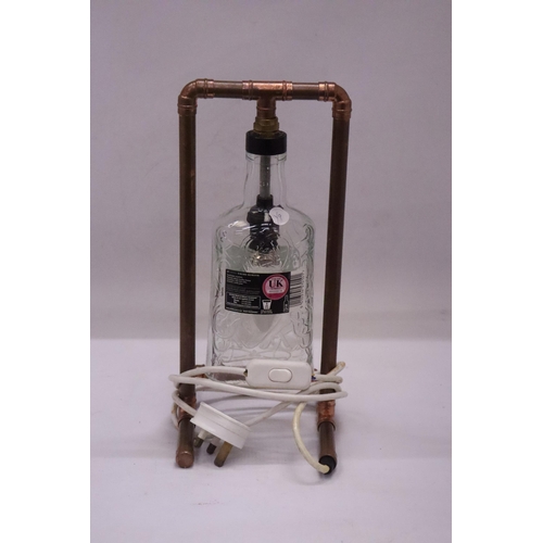 176 - A STEAM PUNK WHISKY BOTTLE LAMP