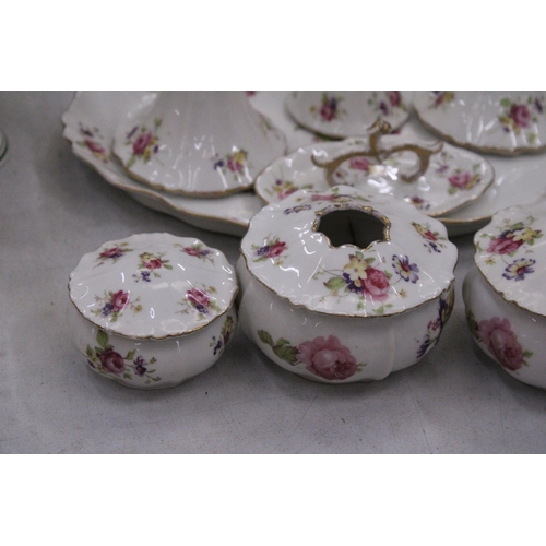 205 - A FLORAL PATTERNED, CERAMIC DRESSING TABLE SET TO INCLUDE A TRAY, CANDLESTICKS, HAT PIN HOLDER, TRIN... 