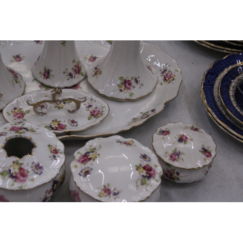 205 - A FLORAL PATTERNED, CERAMIC DRESSING TABLE SET TO INCLUDE A TRAY, CANDLESTICKS, HAT PIN HOLDER, TRIN... 