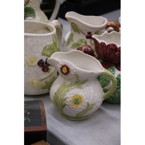 214 - FIVE SHORTER AND SON HAND PAINTED JUGS OF VARIOUS SIZES