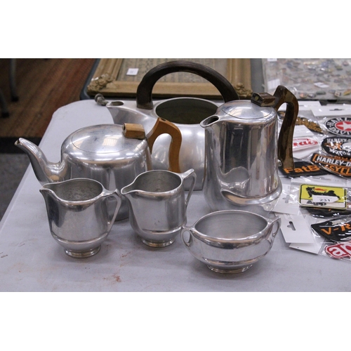 233 - A COLLECTION OF WHITE METAL TEAWARE TO INCLUDE TEA AND COFFEE POTS, JUGS AND A SUGAR BOWL, TO INCLUD... 