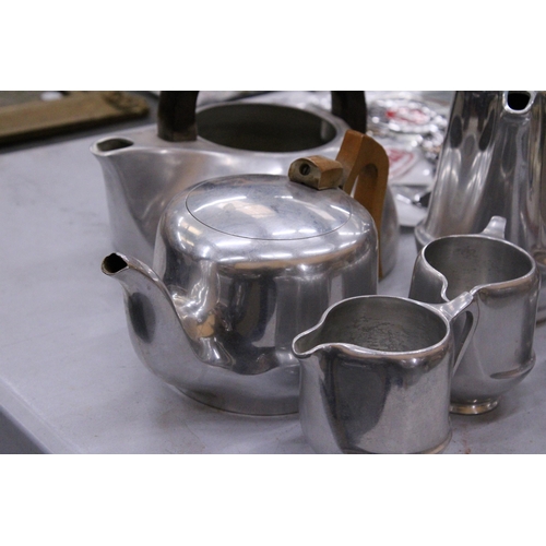 233 - A COLLECTION OF WHITE METAL TEAWARE TO INCLUDE TEA AND COFFEE POTS, JUGS AND A SUGAR BOWL, TO INCLUD... 