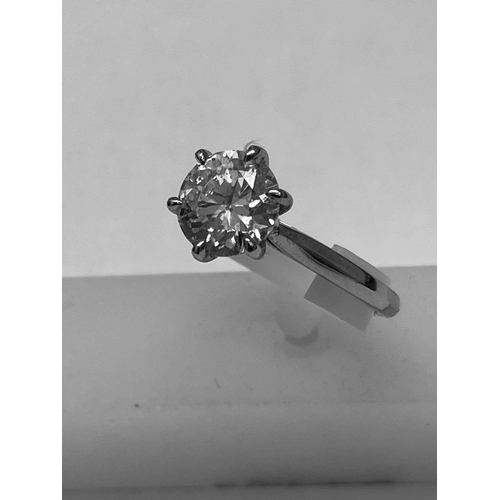 653 - A PLATINUM 2 CARAT DIAMOND SOLITAIRE  BRILLIANT CUT, SIX CLAW SET RING. IGI CERTIFIED COLOURED STONE...