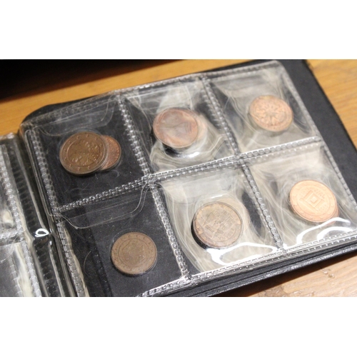 479 - TWO ALBUMS CONTAINING COINS OF MALTA