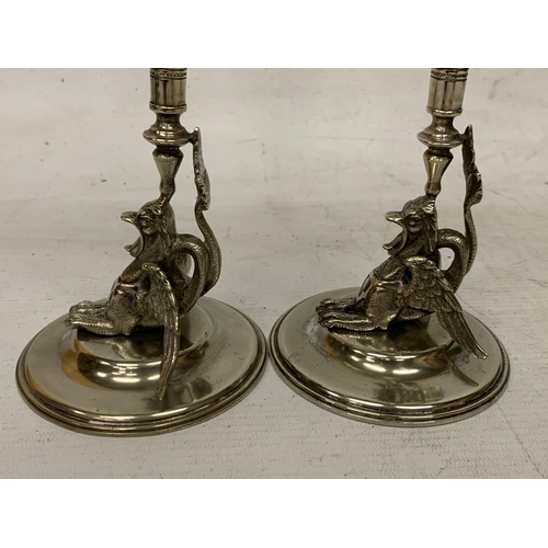 15 - A PAIR OF WHITE METAL AND GLASS SPILL VASE'S WITH WINGED DRAGON BASES - 24.5 CM