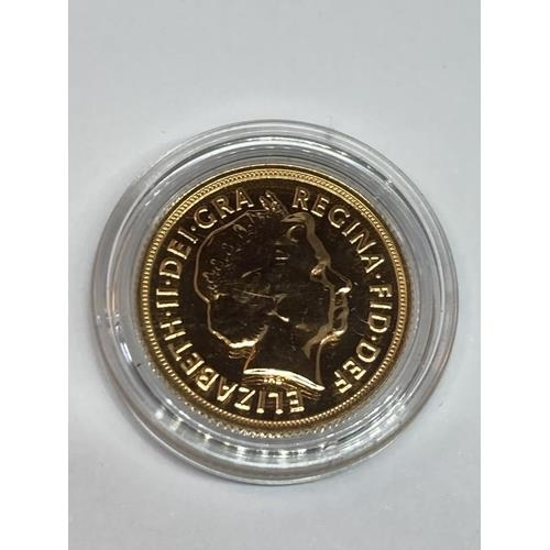 301 - A 2014 GOLD SOVEREIGN IN A CAPSULE WITH A VELVET POUCH