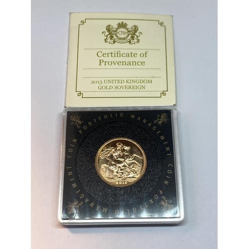 303 - A 2013 GOLD SOVEREIGN IN A CAPSULE WITH CERTIFICATE OF AUTHENTICITY AND A BAG