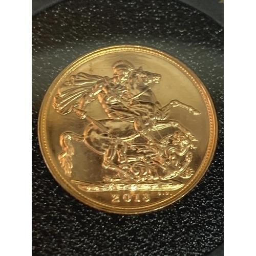 303 - A 2013 GOLD SOVEREIGN IN A CAPSULE WITH CERTIFICATE OF AUTHENTICITY AND A BAG