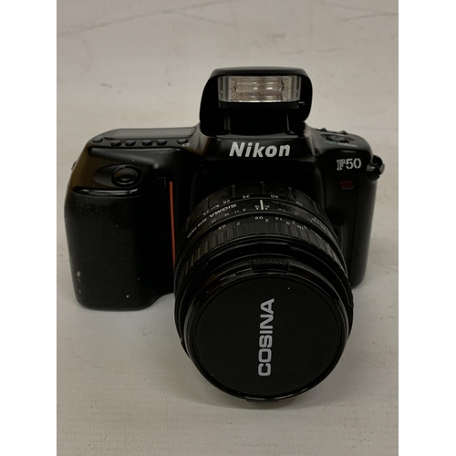 105 - A NIKON F50 CAMERA WITH SIGMA 24/70MM AUTO FOCUS LENS