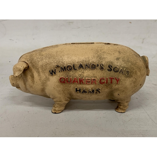 106 - A VINTAGE CAST IRON PIG BANK, 'QUAKER CITY', HEIGHT 9CM, LENGTH 20CM