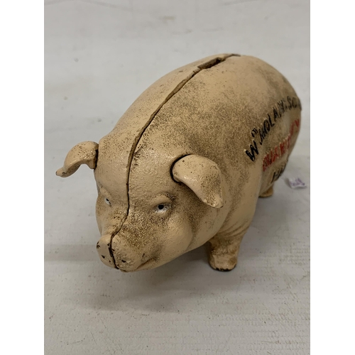 106 - A VINTAGE CAST IRON PIG BANK, 'QUAKER CITY', HEIGHT 9CM, LENGTH 20CM