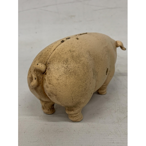 106 - A VINTAGE CAST IRON PIG BANK, 'QUAKER CITY', HEIGHT 9CM, LENGTH 20CM