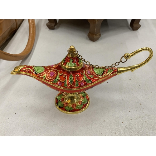 123 - AN ENAMEL MAGIC GENIE LAMP, HEIGHT 9CM