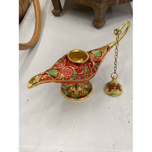 123 - AN ENAMEL MAGIC GENIE LAMP, HEIGHT 9CM