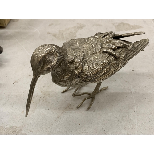 127 - A VINTAGE WHITE METAL FIGURE OF A SNIPE, HEIGHT 12CM, LENGTH 20CM