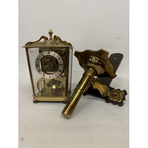 132 - A VINTAGE, POSSIBLY SCHATZ, ANNIVERSARY CLOCK PLUS A WOOD AND BRASS WALL SCONCE