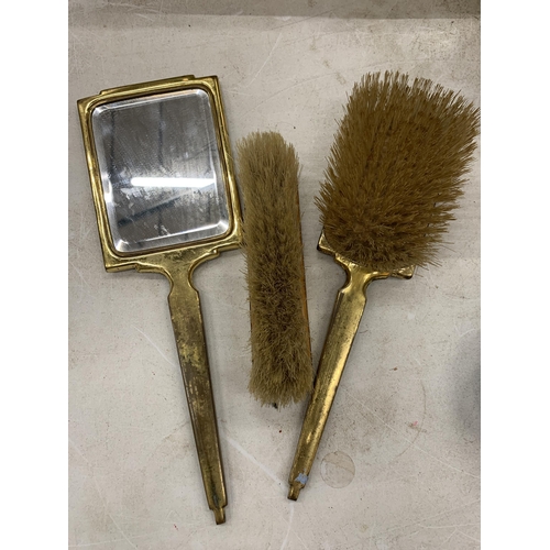 133 - A VINTAGE THREE PIECE BRUSH AND MIRROR SET WITH BLUE ENAMELLED BACK