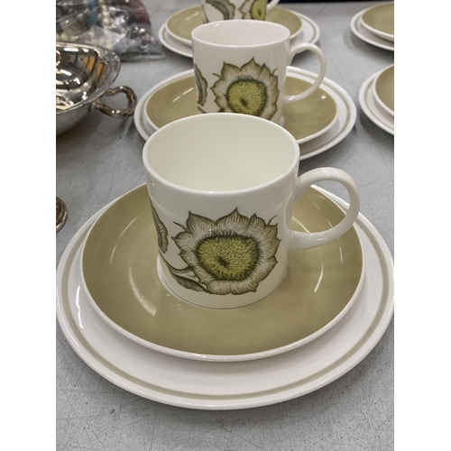 148 - A COLLECTION OF CUPS AND SAUCERS AND SIDE PLATES TO INCLUDE SUSIE COPPER AND WEDGWOOD