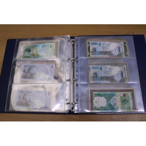 305 - A FOLDER CONTAINING IN EXCESS OF 100 VINTAGE WORLD BANK NOTES TO INCLUDE THE CENTRAL BANK OF EGYPT 5... 