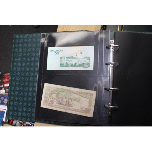 311 - A FOLDER CONTAINING A QUANTITY OF VINTAGE WORLD BANK NOTES TO INCLUDE A COLLECTION OF BRITISH ARMED ... 