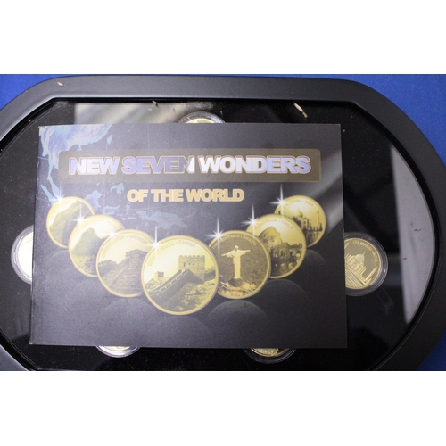 410 - A SEVEN WONDERS OF THE WORLD MEDAL BOX SET TO INCLUDE SEVEN GOLD PLATED AND SILVER PLATED EXAMPLE WI... 