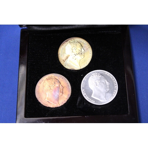 416 - THREE REPLICA WIILIAM IV COINS IN A PRESENTATION BOX